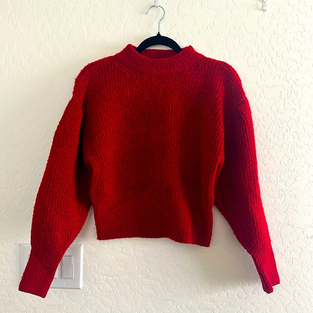 Red crew neck sweater with bell sleeves
